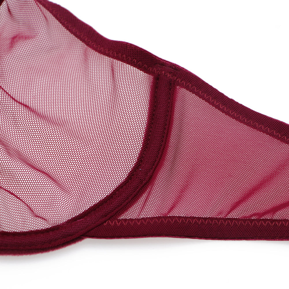 Ultra-thin transparent yarn lingerie set by The Clothing Company Sydney, includes bras, garters, thongs, and stockings.