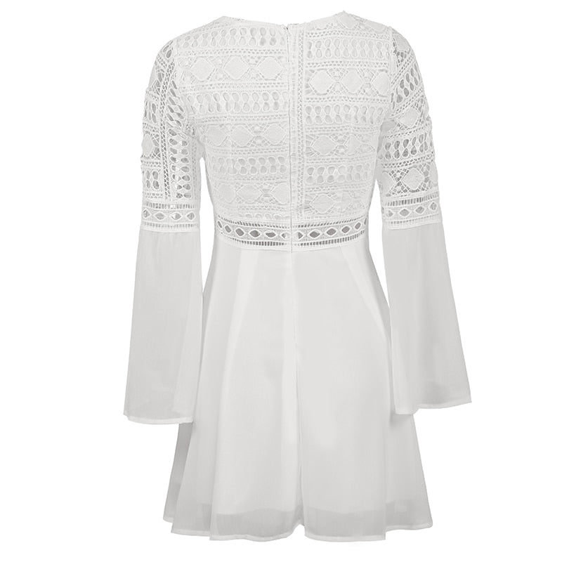 Elegant white V-neck long sleeve lace dress with hollow out design, casual boho style from The Clothing Company Sydney.