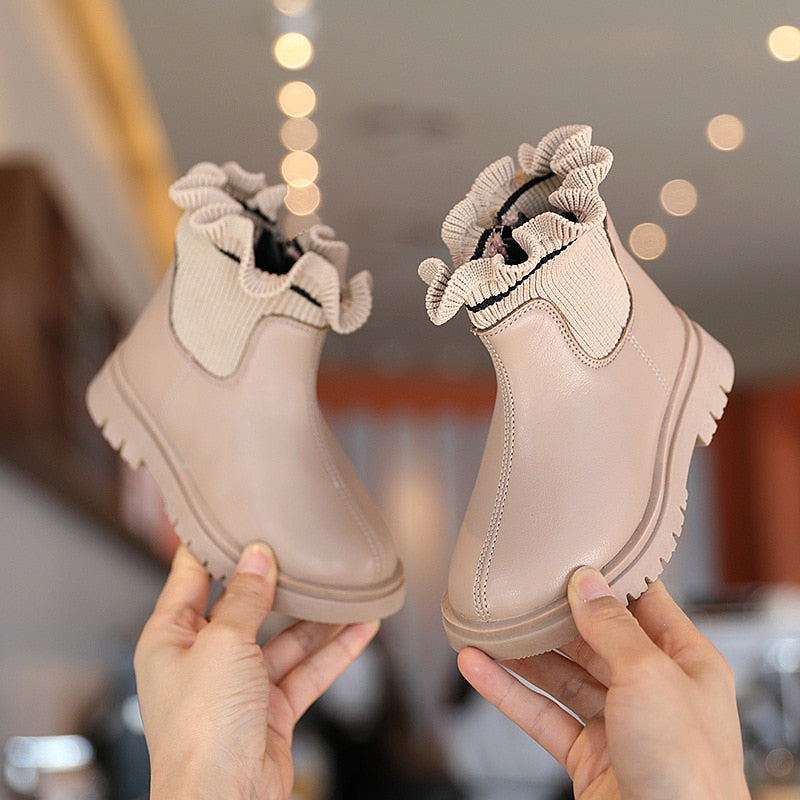 Kids' flower girl boots by The Clothing Company Sydney, plush leather warm winter shoes for boys and girls with soft interior.