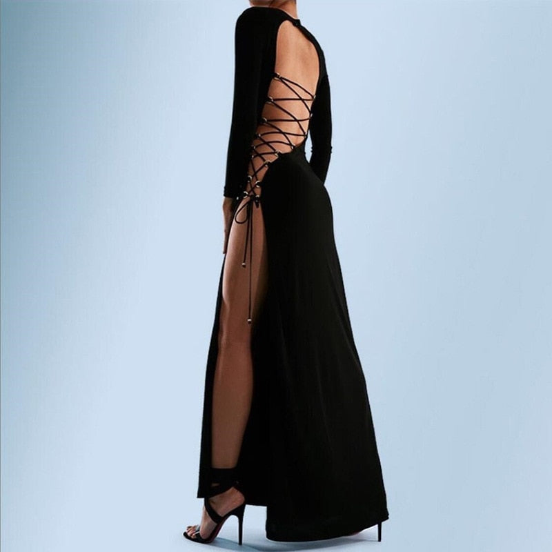 Elegant black fashion bandage long sleeve backless maxi dress by The Clothing Company Sydney, featuring a split design for club and party occasions.