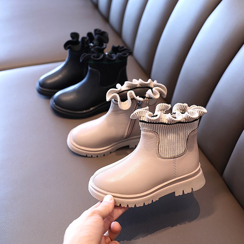 Kids' plush flower girl boots by The Clothing Company Sydney, soft leather, warm, autumn/winter children’s footwear with floral details.