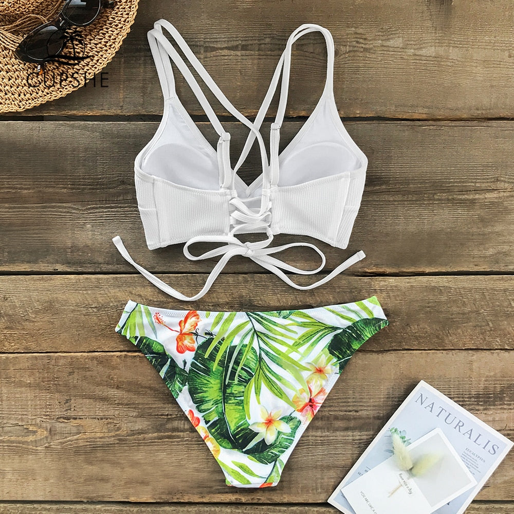 White and green leaf print low-waist bikini set with lace-up design, two-piece swimsuit from The Clothing Company Sydney.