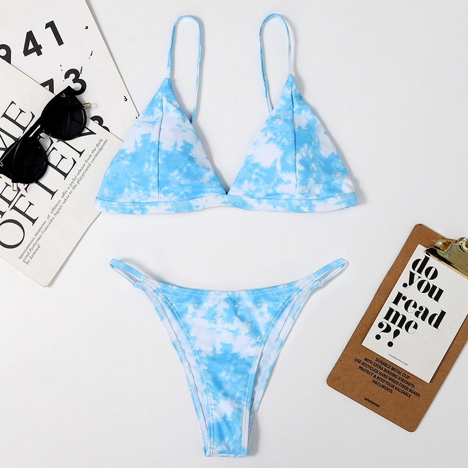 Two-piece tie-dye micro bikini set by The Clothing Company Sydney featuring a thong-style bikini swimsuit for women.