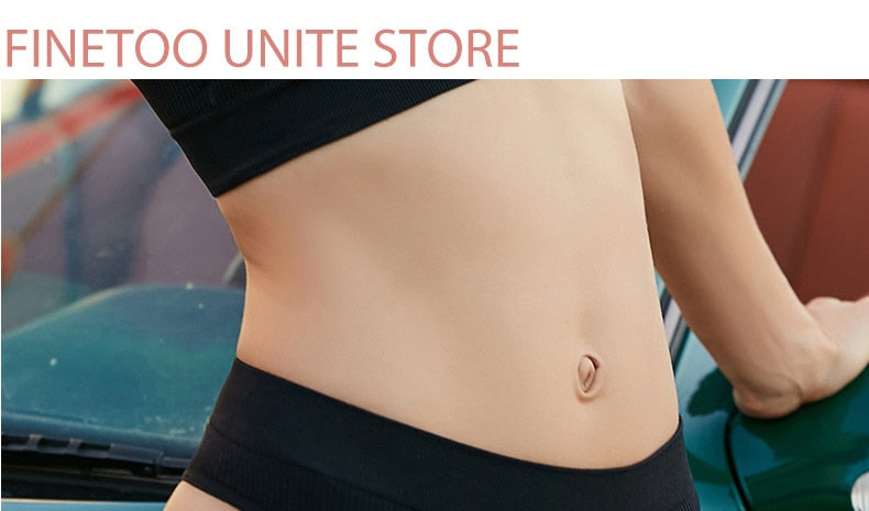 Two seamless women's thong panties from The Clothing Company Sydney, featuring comfortable cotton blend fabric and minimalist design.