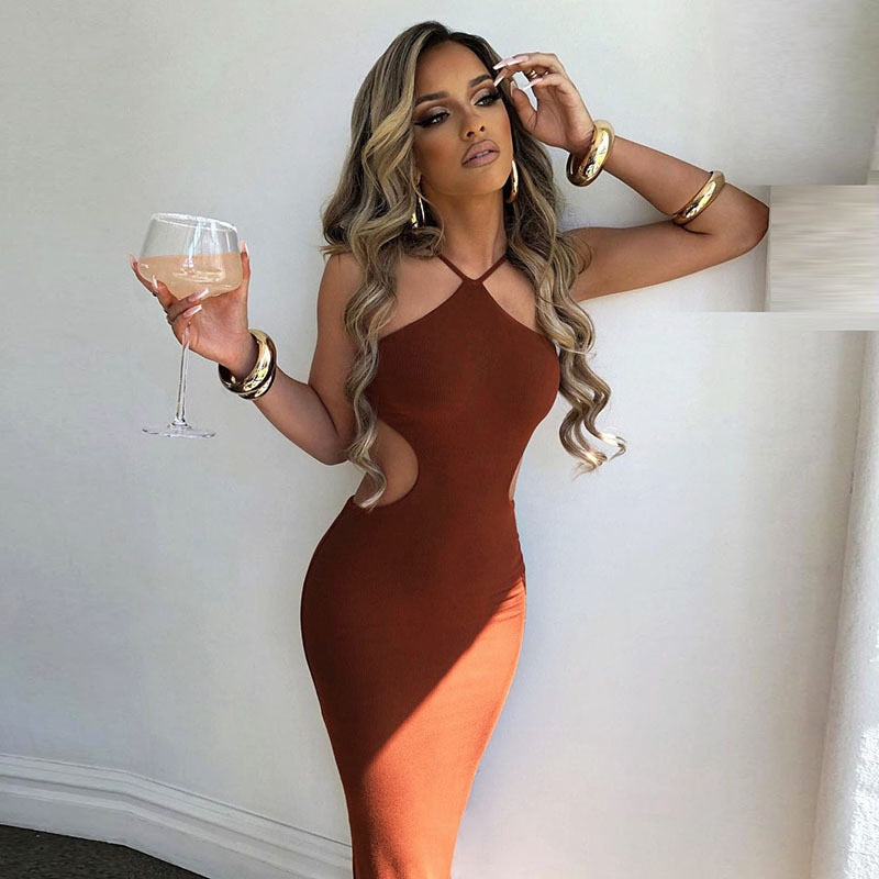 Elegant sleeveless summer halter maxi dress by The Clothing Company Sydney featuring backless design and cutout details.