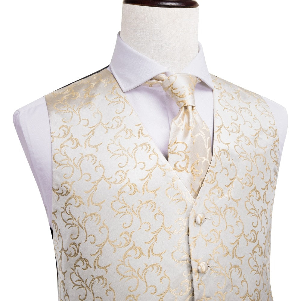 Luxury men's silk vest and tie set featuring paisley, floral, and plaid patterns in blue, gold, red, and silver for wedding attire.