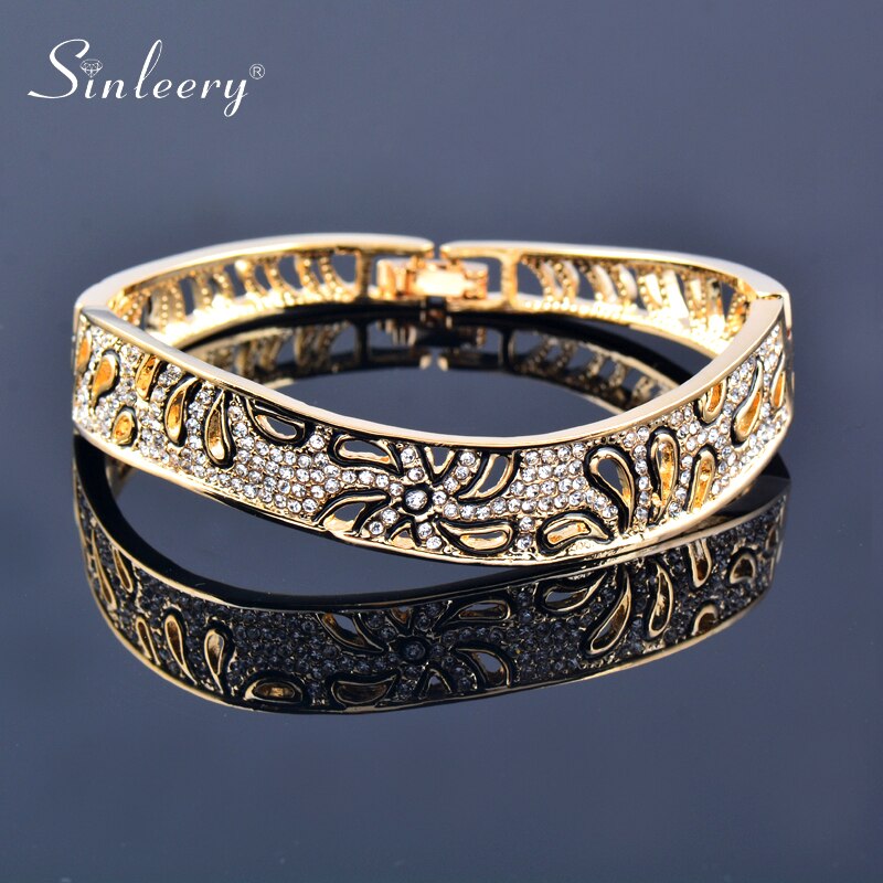 Rose gold and silver flower bangles with crystal accents, elegant jewelry bracelet for women, perfect as a gift.