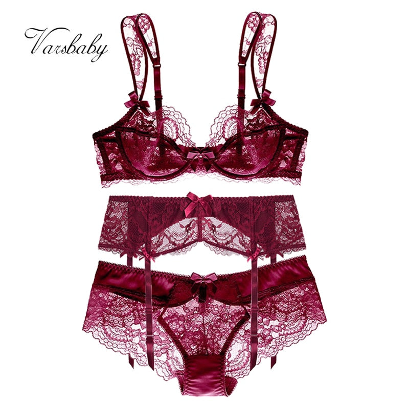 Plus size floral lace lingerie set by The Clothing Company Sydney featuring ultra-thin gathered bra, panties, and garter belt.