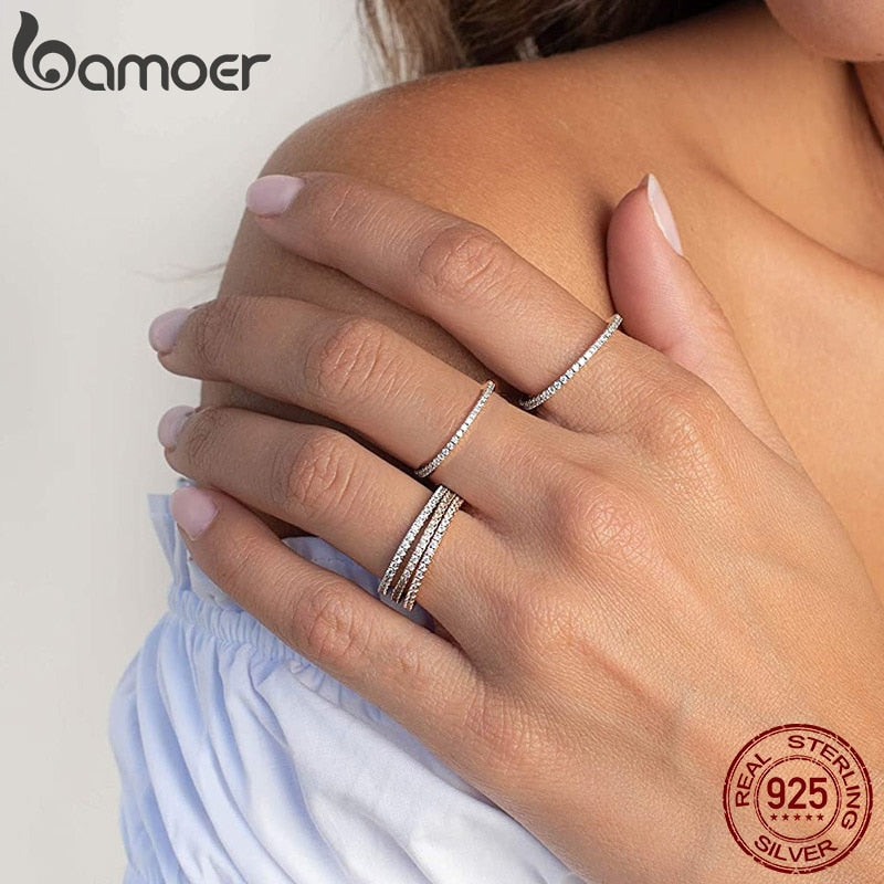 Sterling silver CZ simulated diamond stackable ring with platinum plating, showcasing an eternity band for women.