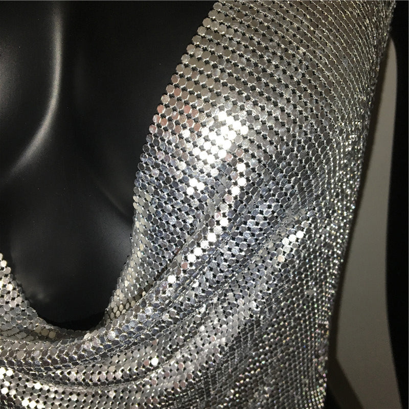 Metal sequined tank top by The Clothing Company Sydney featuring a backless, cropped design with gold and silver glitter for summer wear.