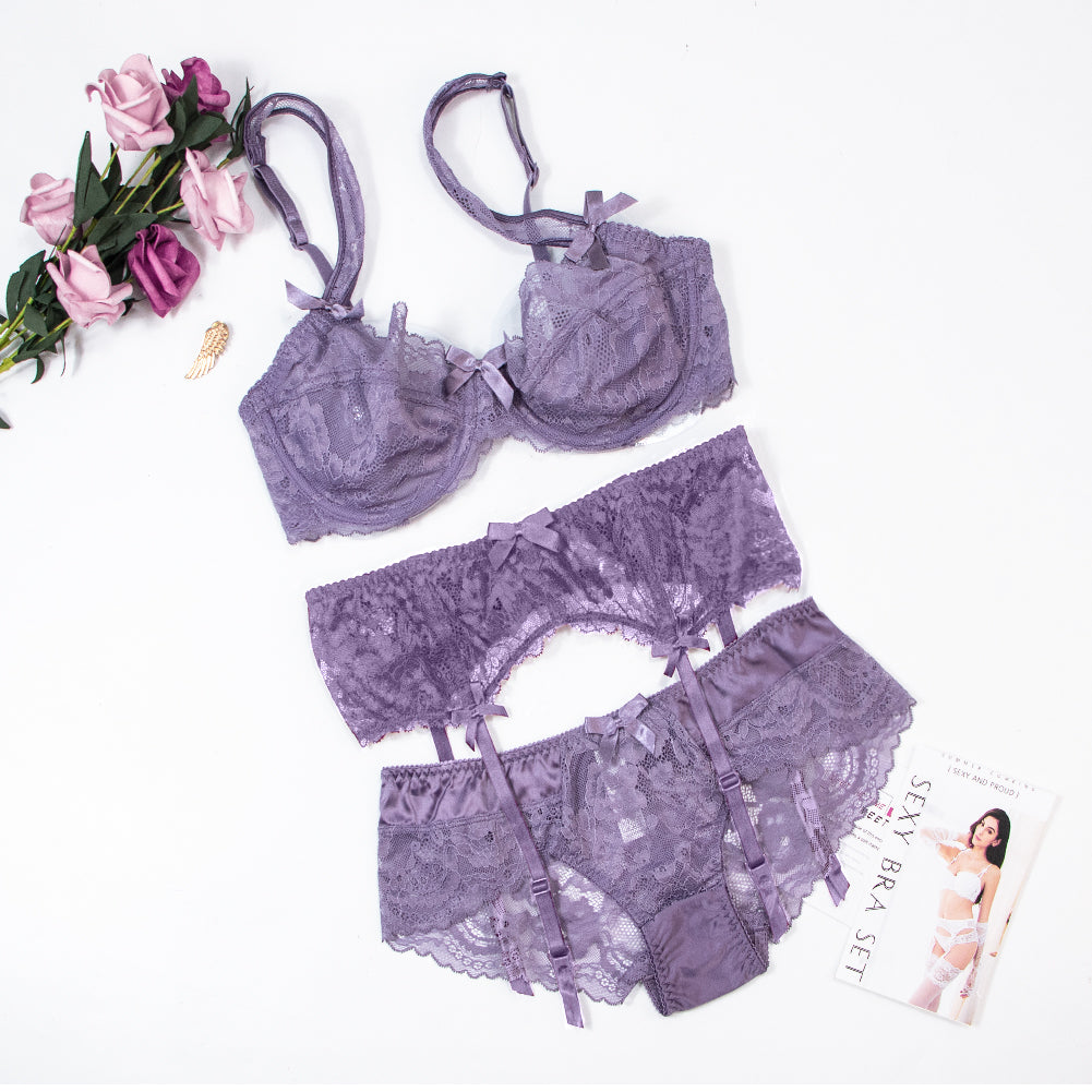 Plus size floral lace lingerie set with bowknot details, includes bra, panties, and garter, from The Clothing Company Sydney.