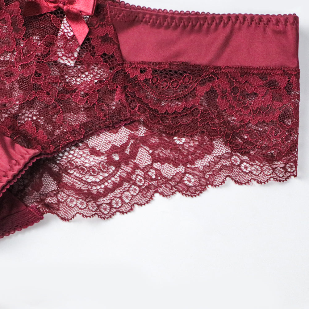 Plus size floral lace lingerie set with bowknot details, includes bra, panties, and garter from The Clothing Company Sydney.