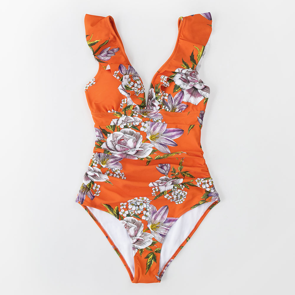 Solid black ruffled one-piece swimsuit with lace-up detail from The Clothing Company Sydney, perfect for beach and poolside lounging.