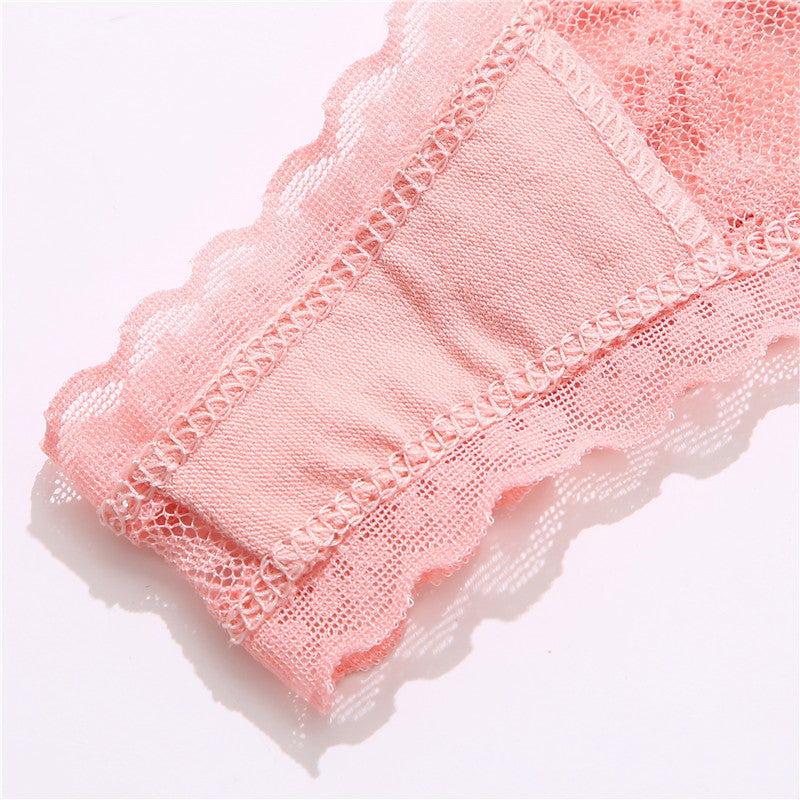 Two lace G-string thong panties from The Clothing Company Sydney featuring floral design and transparent, sexy lingerie briefs.