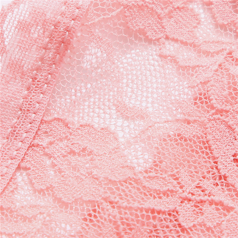 Two lace G-string thong panties from The Clothing Company Sydney with floral design and transparent underpants lingerie briefs.