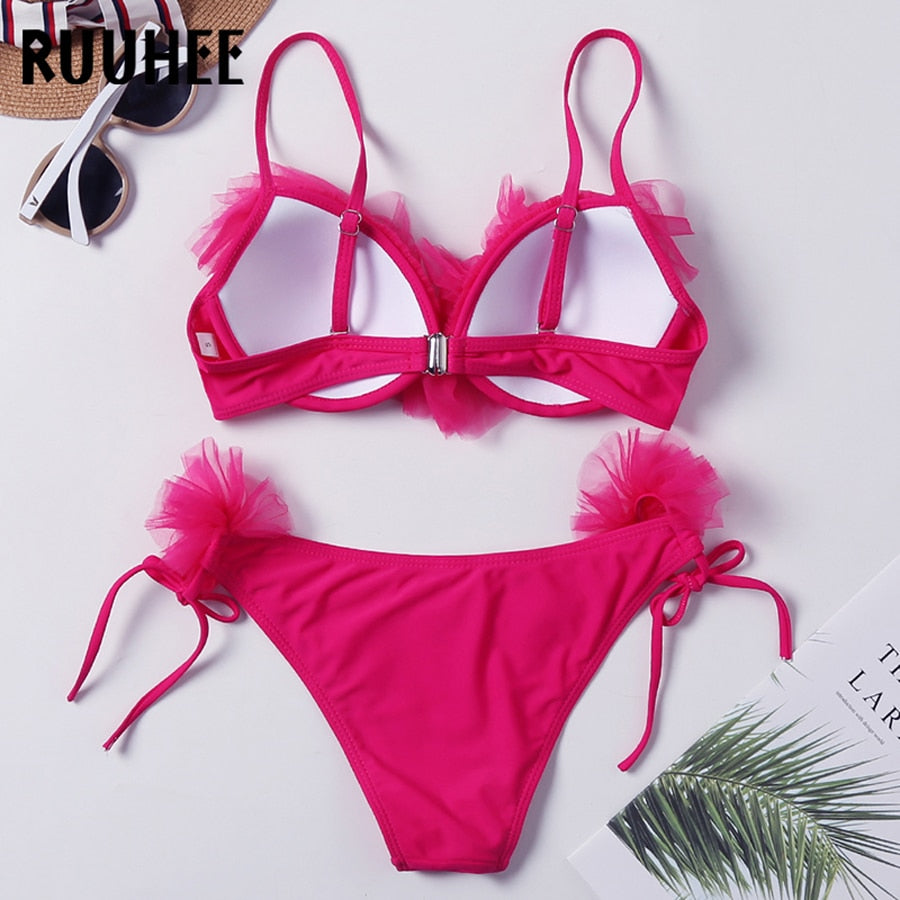 Two-piece leopard print bandeau bikini swimsuit for women with ruffle details and push-up design, by The Clothing Company Sydney.