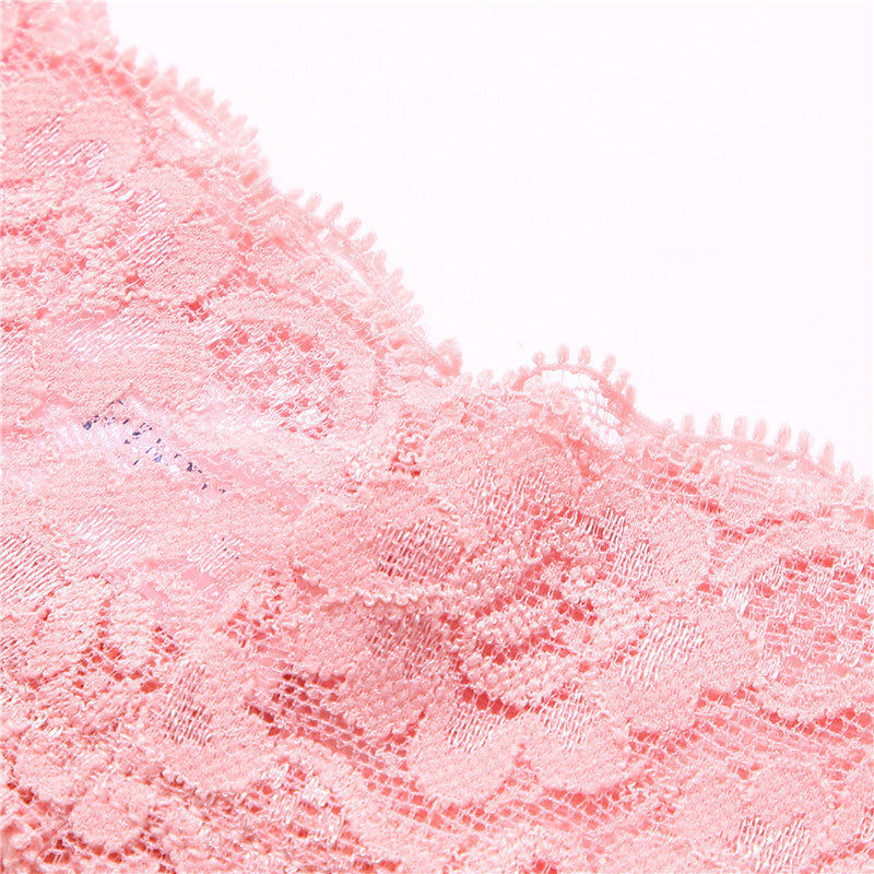 Two lace G-string thong panties from The Clothing Company Sydney, featuring floral design and transparent, delicate lingerie briefs.