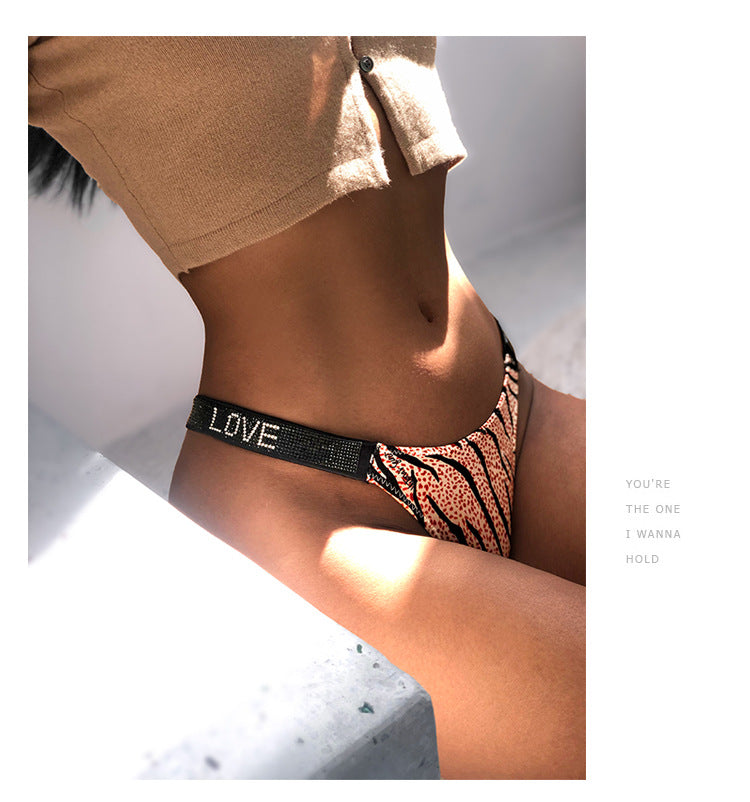 Ice silk seamless G-string lingerie with rhinestone leopard design, low waist fit, from The Clothing Company Sydney.