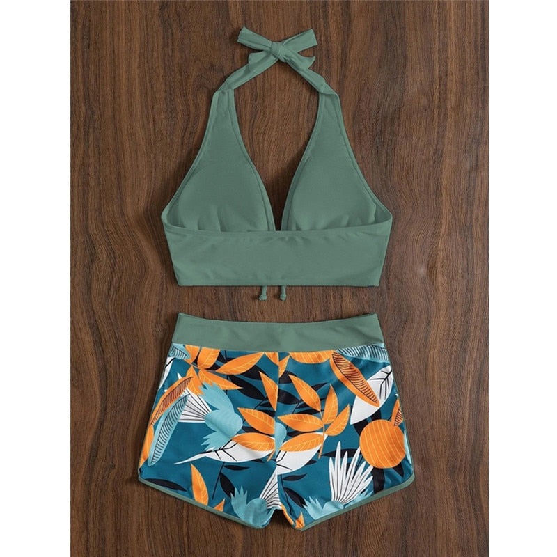 Two-piece swimsuit bikini set with lace print, high waist, halter neck, and deep V-neck from The Clothing Company Sydney.