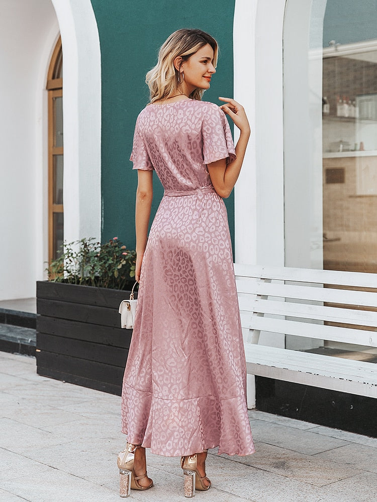 Leopard print party dress by The Clothing Company Sydney featuring V-neck, short sleeves, ruffled belt, and elegant split.