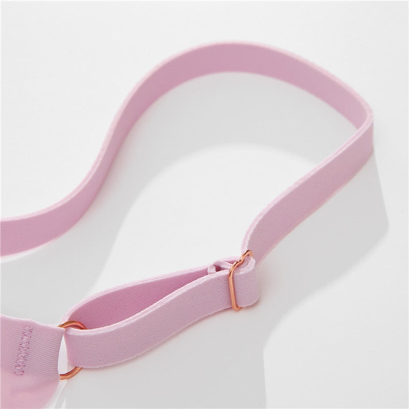 Three-pack of seamless women G-string underwear by The Clothing Company Sydney, featuring adjustable straps and ice silk material.