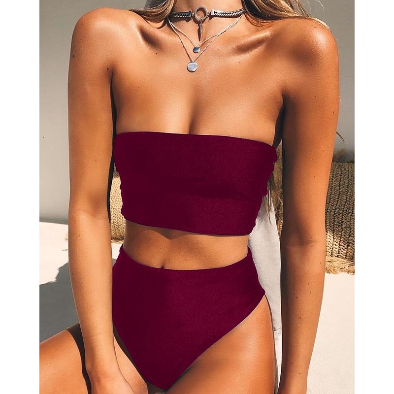 Bright orange, pink, and yellow halter bikini set with thong-style bottoms, ideal for summer beachwear from The Clothing Company Sydney.