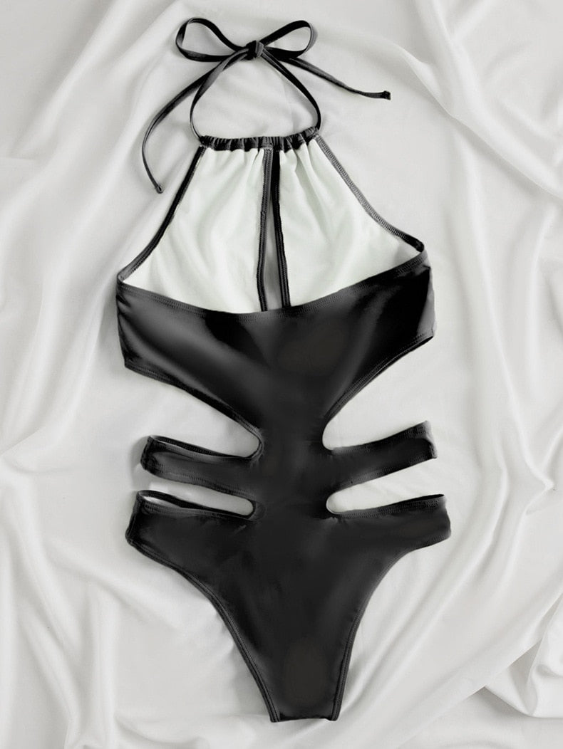 Solid tied halter high waist swimsuit for women with push-up and hollow design, black one-piece monokini by The Clothing Company Sydney.