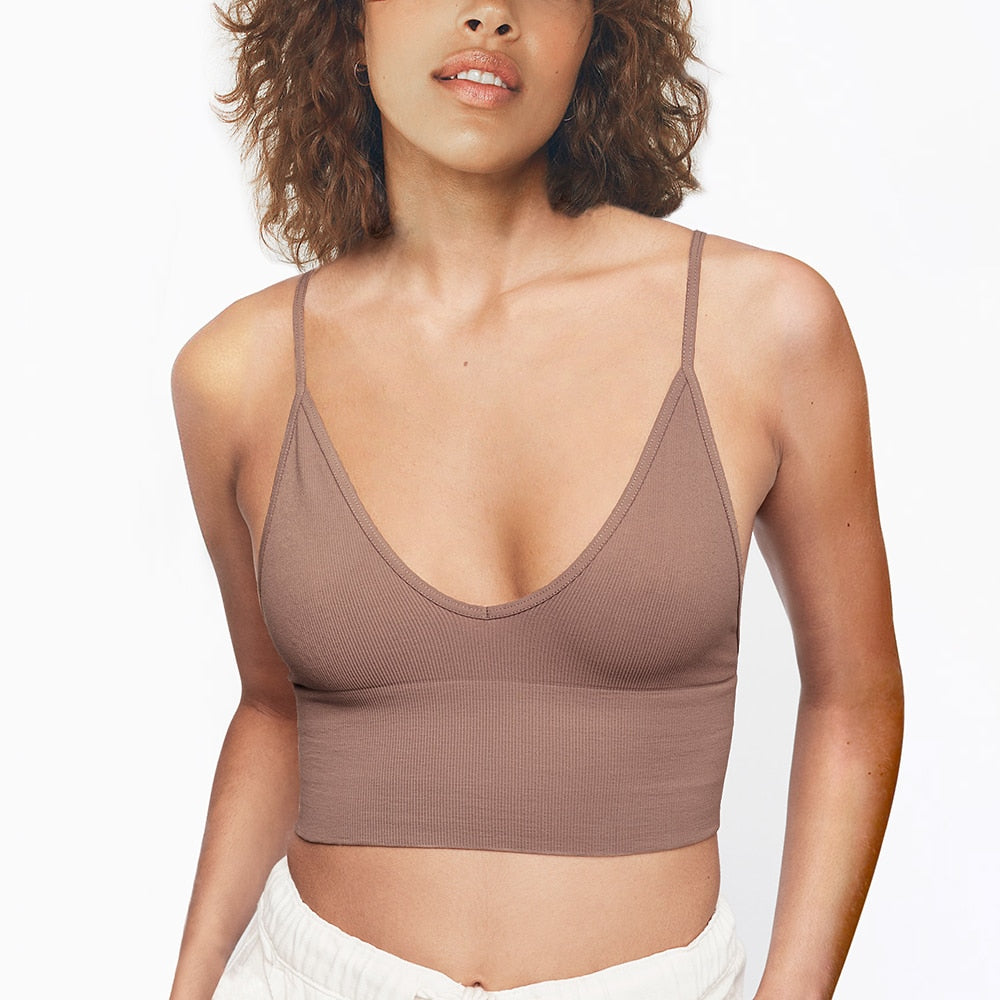 Three seamless low back bras from The Clothing Company Sydney, adjustable strap, no padding, unlined bralette for women.