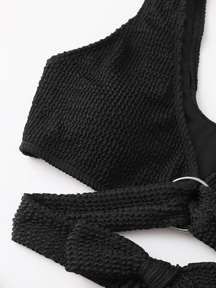 Metal ring textured bikini swimsuit by The Clothing Company Sydney featuring push-up design, bandage style, and beach-ready swimwear.