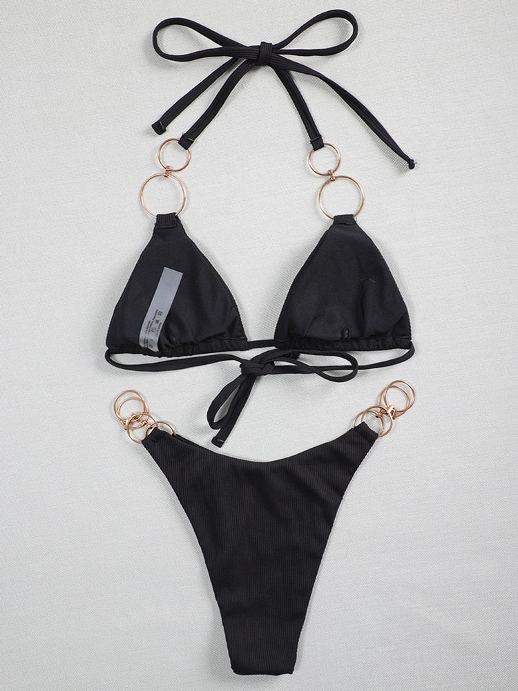 Black 2-piece metal rings micro bikini swimsuit by The Clothing Company Sydney, featuring push-up design and Brazilian style for beachwear.