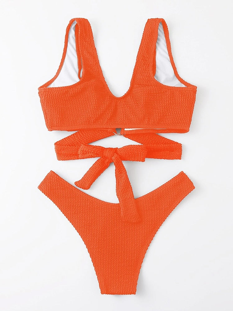 Metal ring textured bikini swimsuit by The Clothing Company Sydney featuring push-up top and bandage design for beachwear.