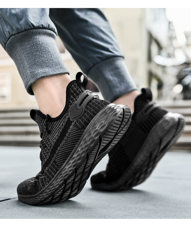 Men and women wearing breathable mesh sneakers by The Clothing Company Sydney, lightweight athletic running shoes on white background.