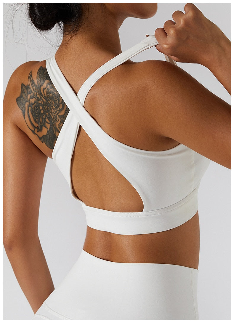 Women's yoga set with high waist leggings, skirt, and sports bra from The Clothing Company Sydney, ideal for gym and workout sessions.