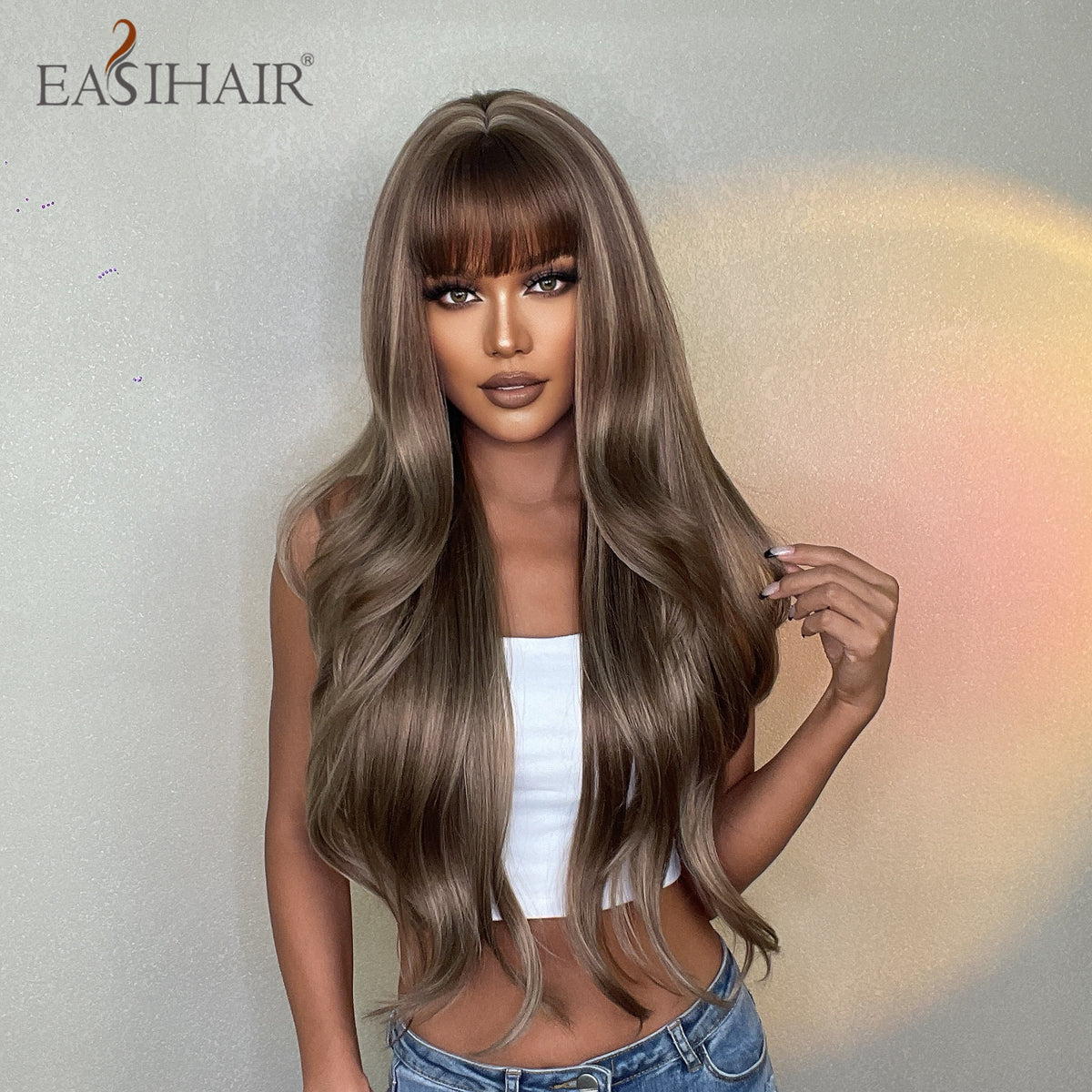 Long brown mixed blonde synthetic wig with natural waves and bangs, heat-resistant for daily wear or cosplay, by The Clothing Company Sydney.
