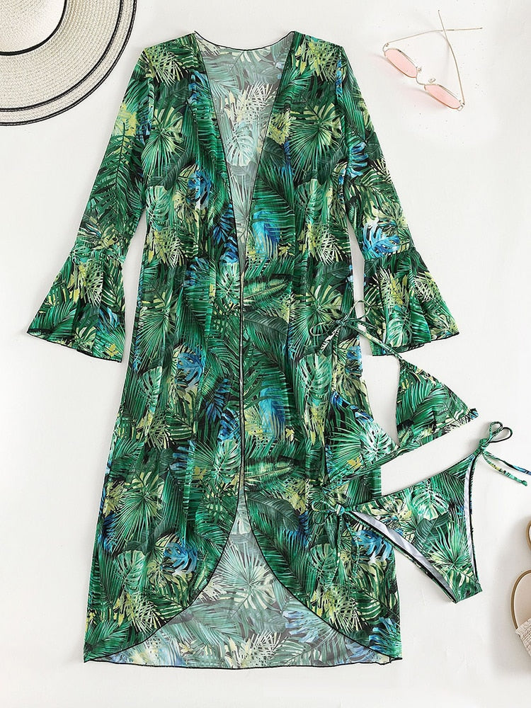 Three-piece bikini and beach skirt tunic set from The Clothing Company Sydney, perfect for summer beach cover-ups and swimsuits.