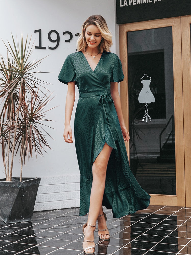 Leopard print party dress by The Clothing Company Sydney with V-neck, short sleeves, ruffled belt, and elegant split lace details.