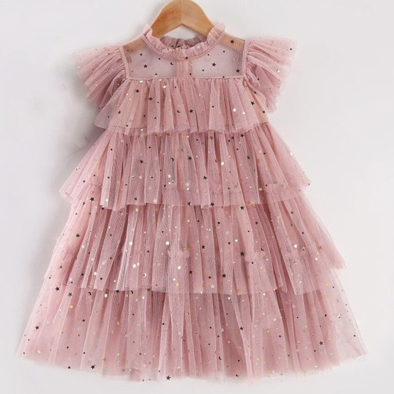 Girls' summer princess costume by The Clothing Company Sydney featuring sleeveless layered tulle dress with cake flower details.