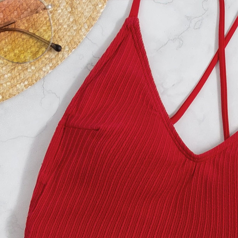 High-cut backless ribbed one-piece thong swimsuit by The Clothing Company Sydney, featuring a solid design and stylish monokini style.