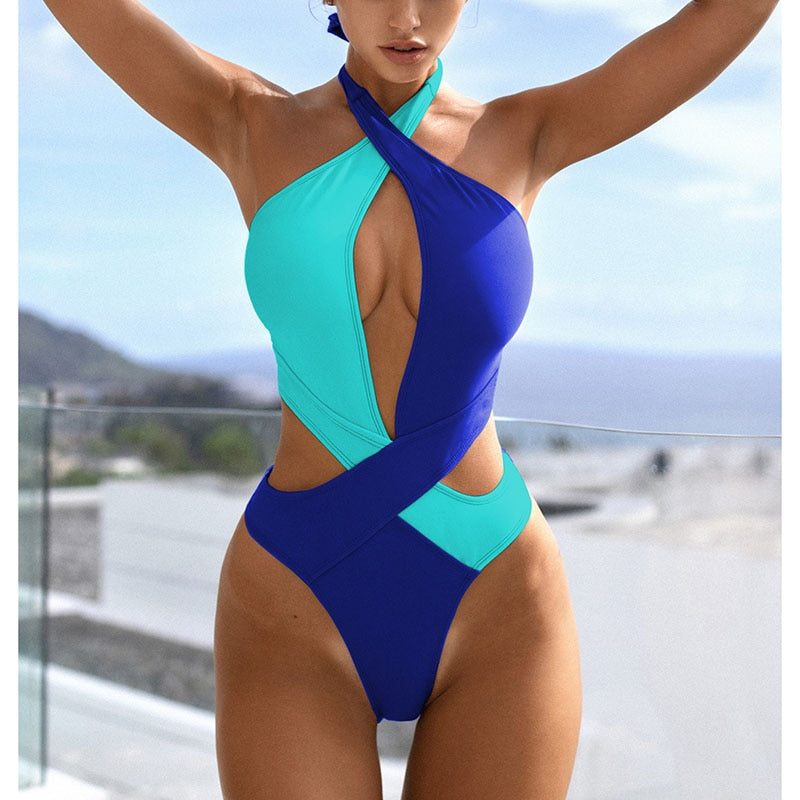 Colorblock cut out one-piece swimsuit by The Clothing Company Sydney, featuring halter neckline, high-cut design, and beach-ready style.