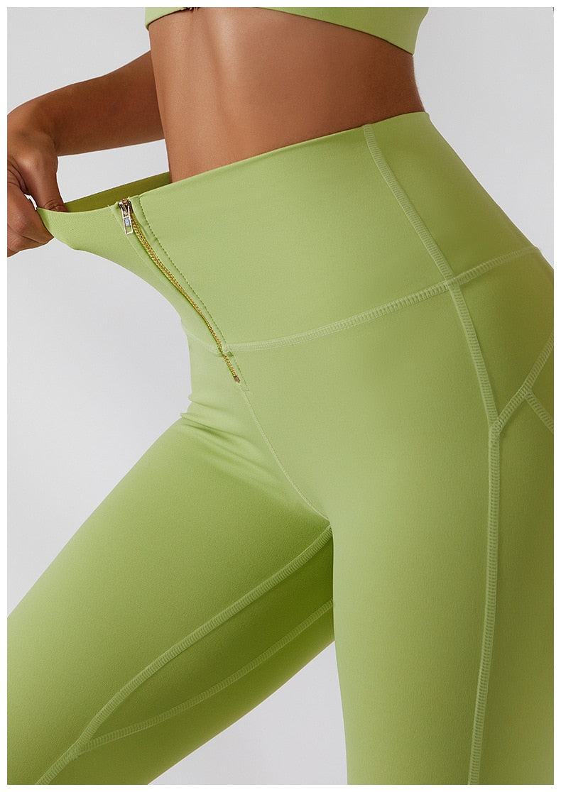 Women's yoga fitness set by The Clothing Company Sydney featuring high waist leggings, a skirt, and a zip sports bra.