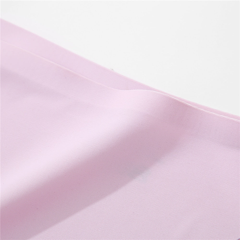 Two seamless silky G-string thong underwear from The Clothing Company Sydney with low-rise fit and adjustable waistband straps.