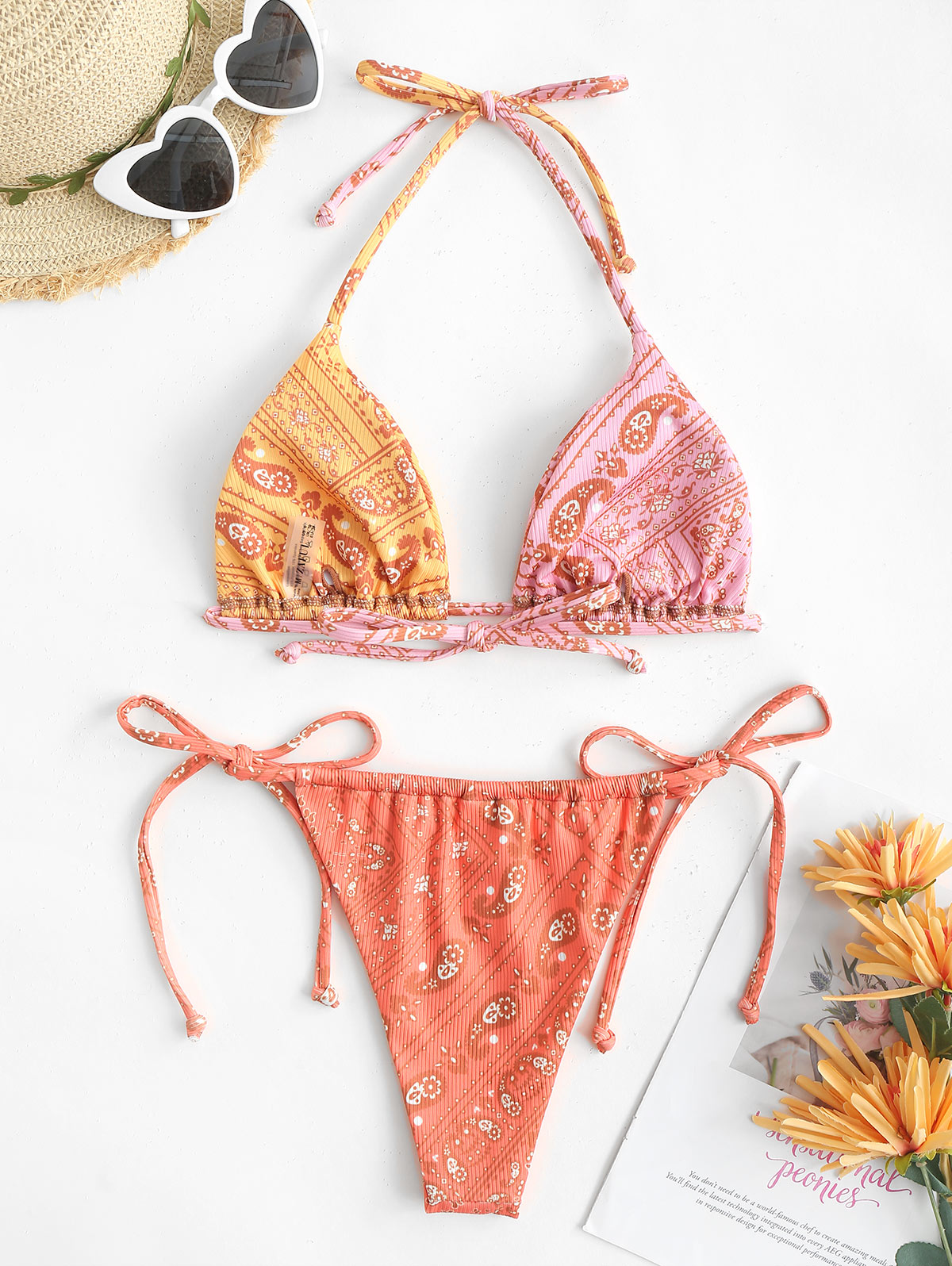 Two-piece bohemian paisley print bikini set with ribbed fabric, halter top, and tie-side bottoms, by The Clothing Company Sydney.