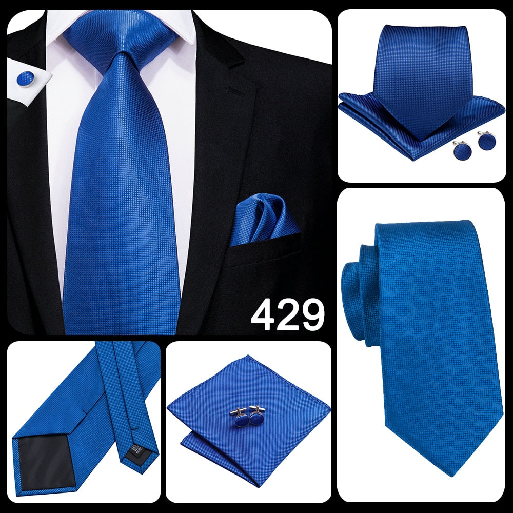 Blue silk men's business tie with dot pattern, plaid design, and matching cufflinks, suitable for wedding or business attire.