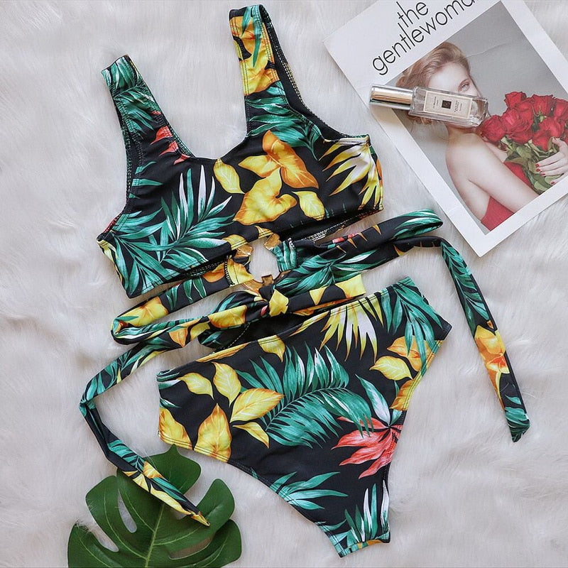 Hollow out floral one-piece swimsuit by The Clothing Company Sydney featuring cutouts, metal accents, and push-up design for beachwear.