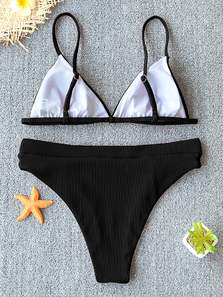 Black 2-piece metal rings micro bikini swimsuit with push-up design, from The Clothing Company Sydney, perfect for beachwear and swimming.