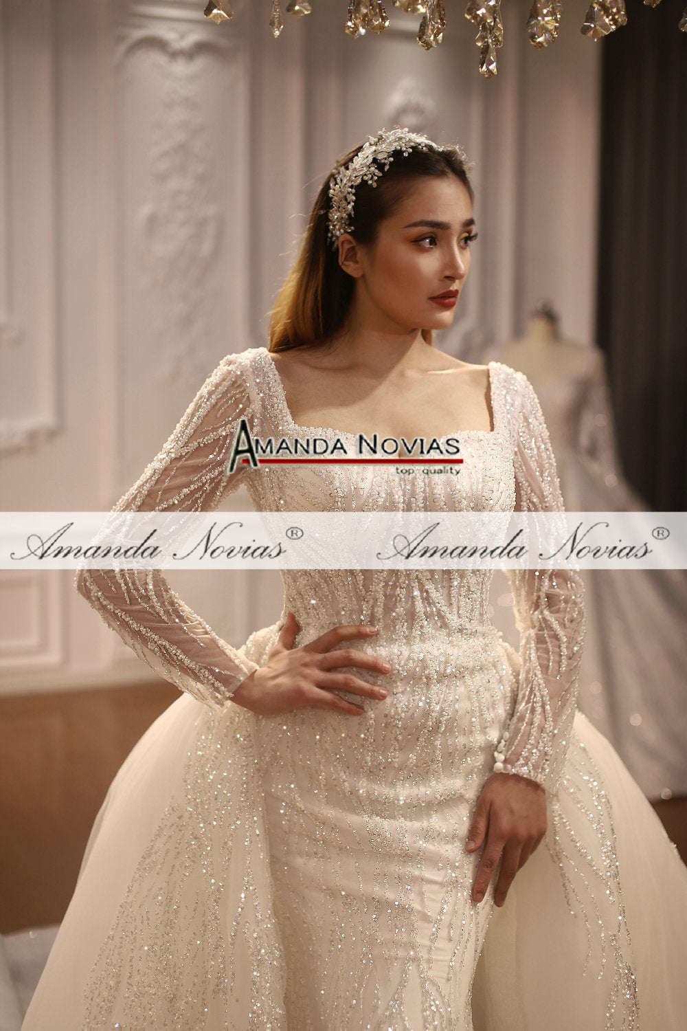 Elegant two-in-one luxury mermaid wedding gown by The Clothing Company Sydney, featuring intricate lace and flowing train.