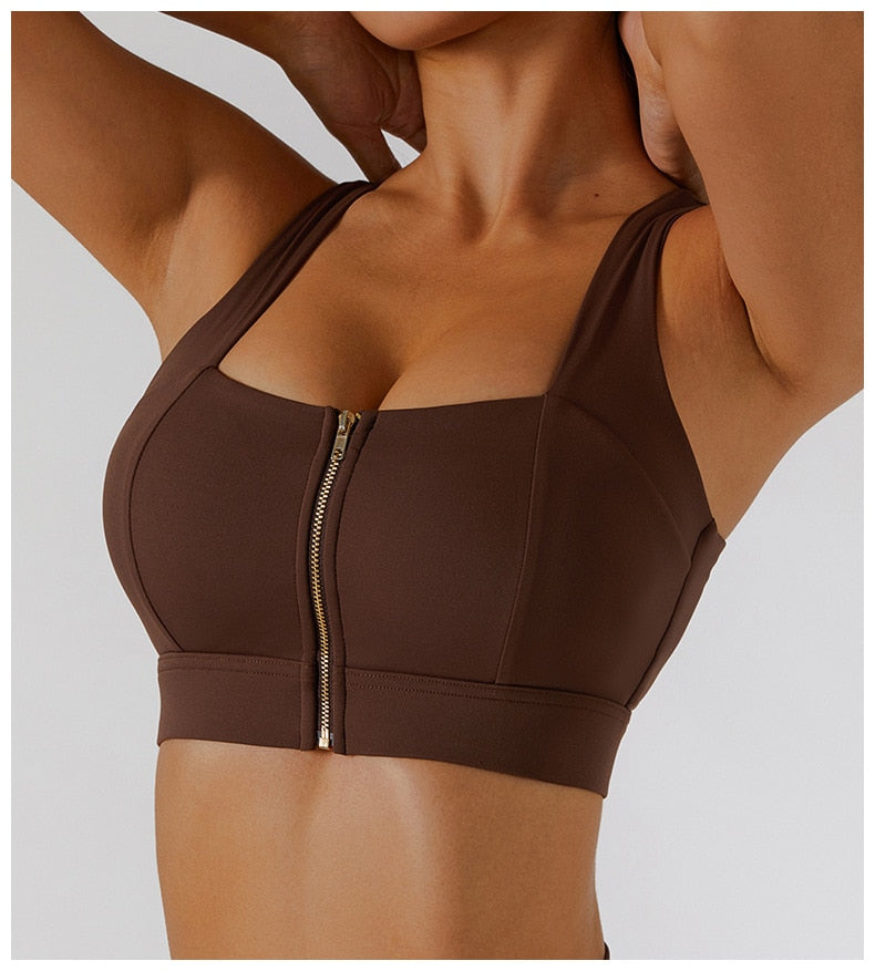 Women's yoga set by The Clothing Company Sydney featuring high waist leggings, a skirt, and a sports bra for gym workouts.