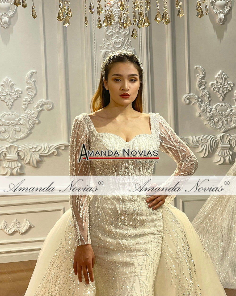 Elegant two-in-one luxury mermaid wedding dress with intricate lace details and flowing train, designed by The Clothing Company Sydney.