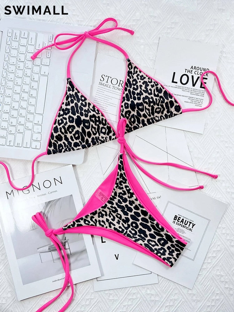 Leopard print bikini swimsuit by The Clothing Company Sydney featuring push-up top, halter design, and Brazilian cut for beachwear.