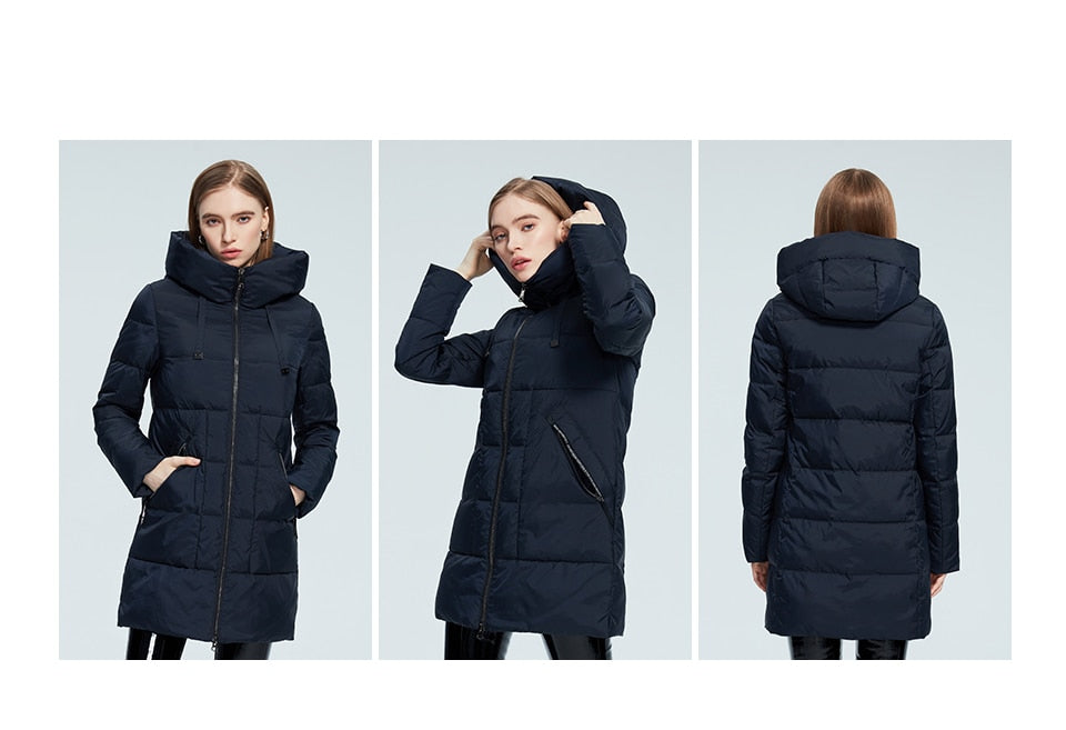 Women's winter jacket by The Clothing Company Sydney with stand collar, hood, large pockets, windproof mid-length parka for cold weather.